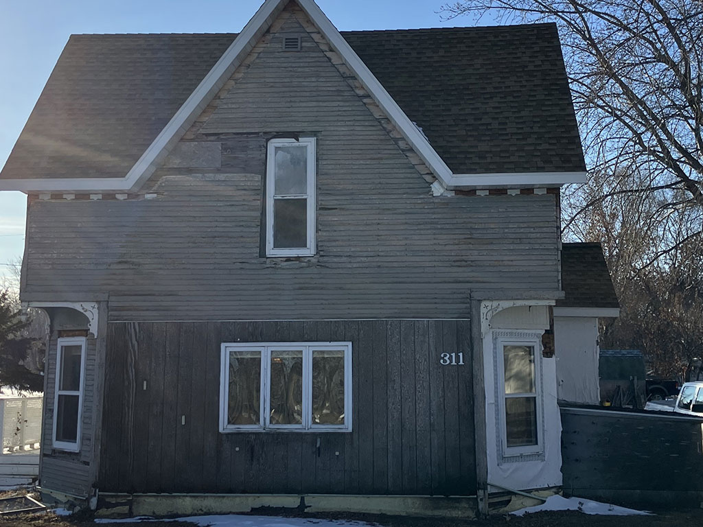 before new siding was installed on a house