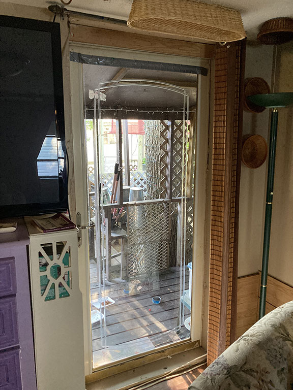 before entry door of home was replaced