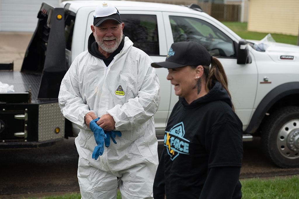 two WxForce team members getting ready to work